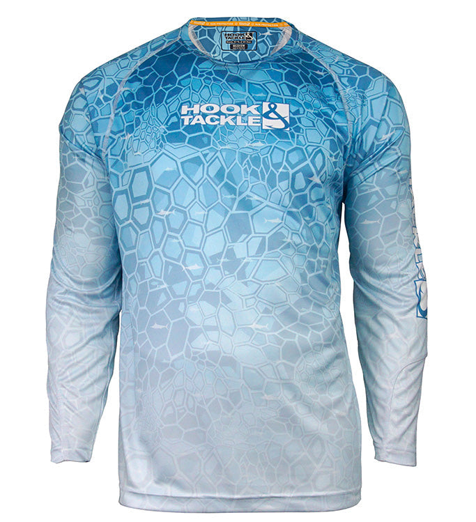 A man wearing a blue long sleeve fishing shirt with a geometric hex pattern and Hook & Tackle logo.
