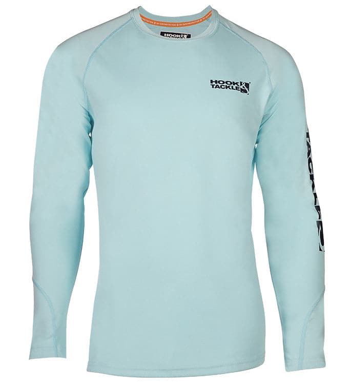 A man wearing a bright blue long-sleeve performance fishing shirt with the brand logo on the chest, designed for sun protection and moisture management.