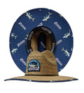 A tan straw lifeguard hat with a yellowfin tuna print under the brim and a black adjustable chin strap.