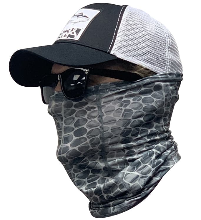 A person wearing a patterned blue or gray fishing neck gaiter for UV sun protection while fishing.