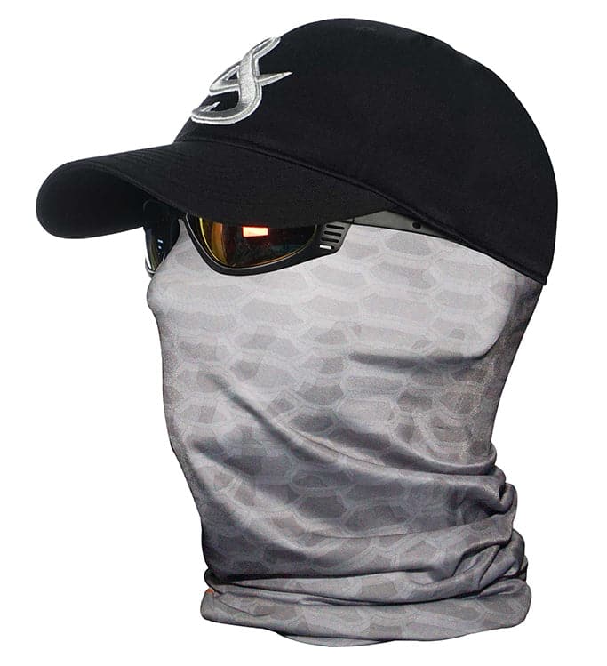 A grey neck gaiter with a fish scale pattern worn as a face covering beneath a black baseball cap.