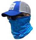A person wearing a blue patterned fishing neck gaiter and a baseball cap.