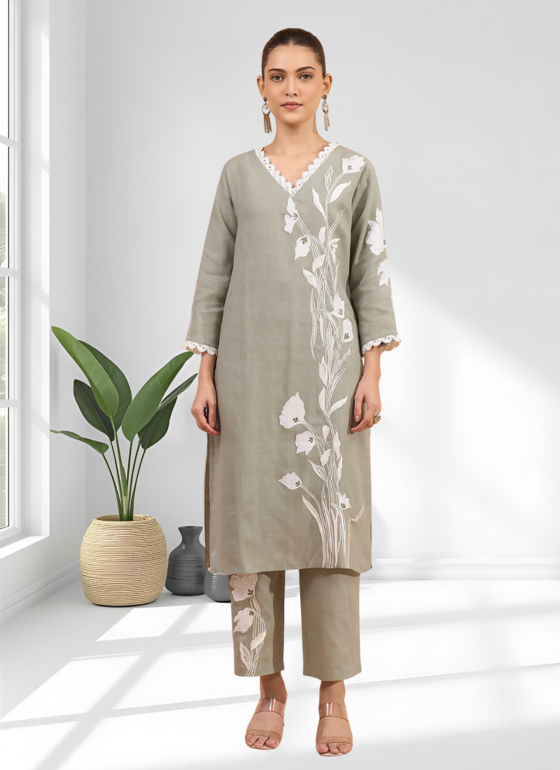 Gray long linen kurta with elegant embroidery and V-neck paired with matching pants.