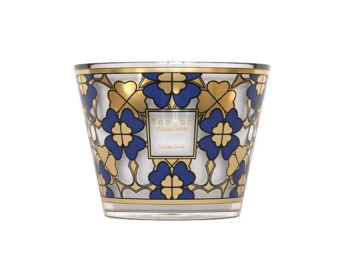 Lucky Love Max 10 Candle in midnight blue glass with 24-carat gold four-leaf clover print