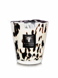 A sophisticated Black Pearls Max 16 candle in a dark hand-blown glass vessel on a neutral background.