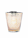 Baobab Collection Women Max 16 candle in a pink, gold, and white geometric glass vessel.