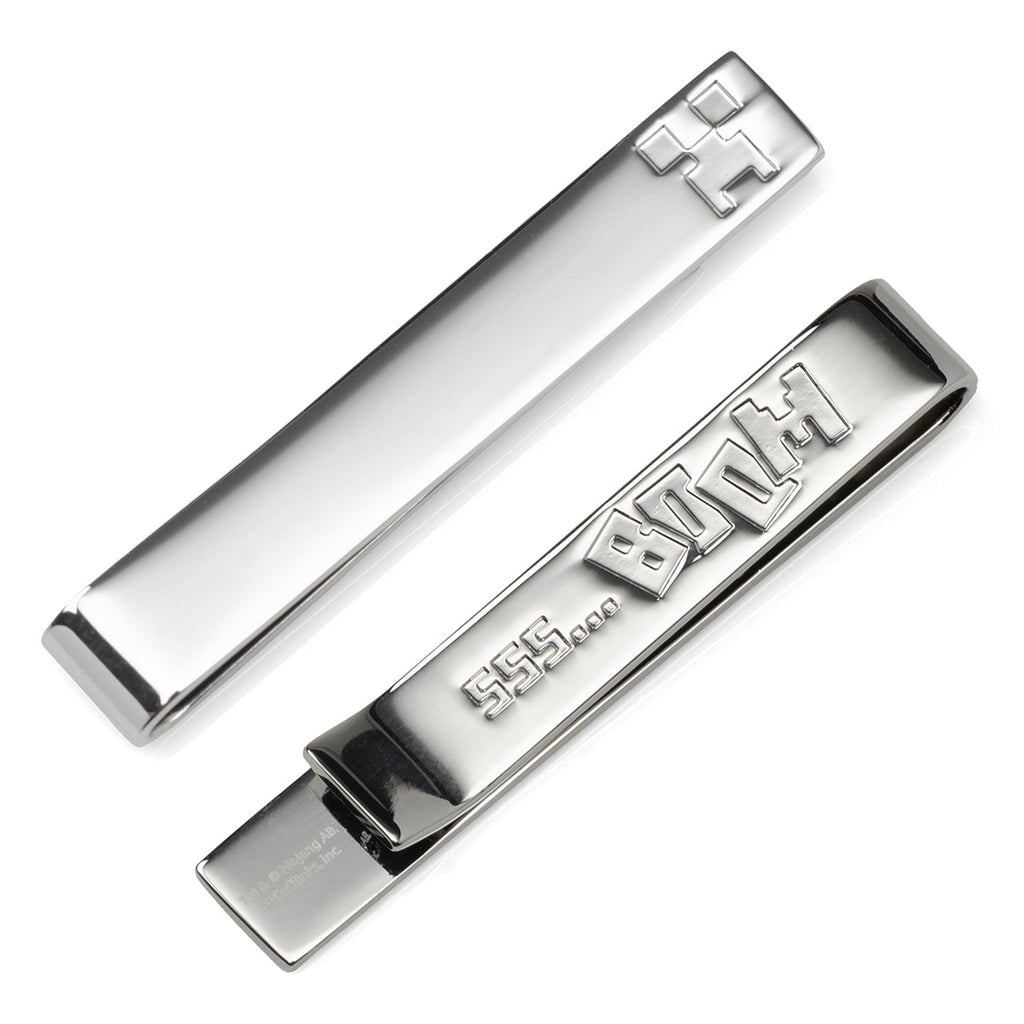 Silver tone Minecraft Creeper tie bar showing both the front face engraving and the hidden SSSS... message on the back.