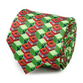 A close up and a flat lay of a green Minecraft necktie featuring an isometric pattern of TNT blocks and Creeper faces.