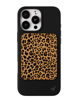 Leopard print MagSafe phone wallet attached to a black iPhone case