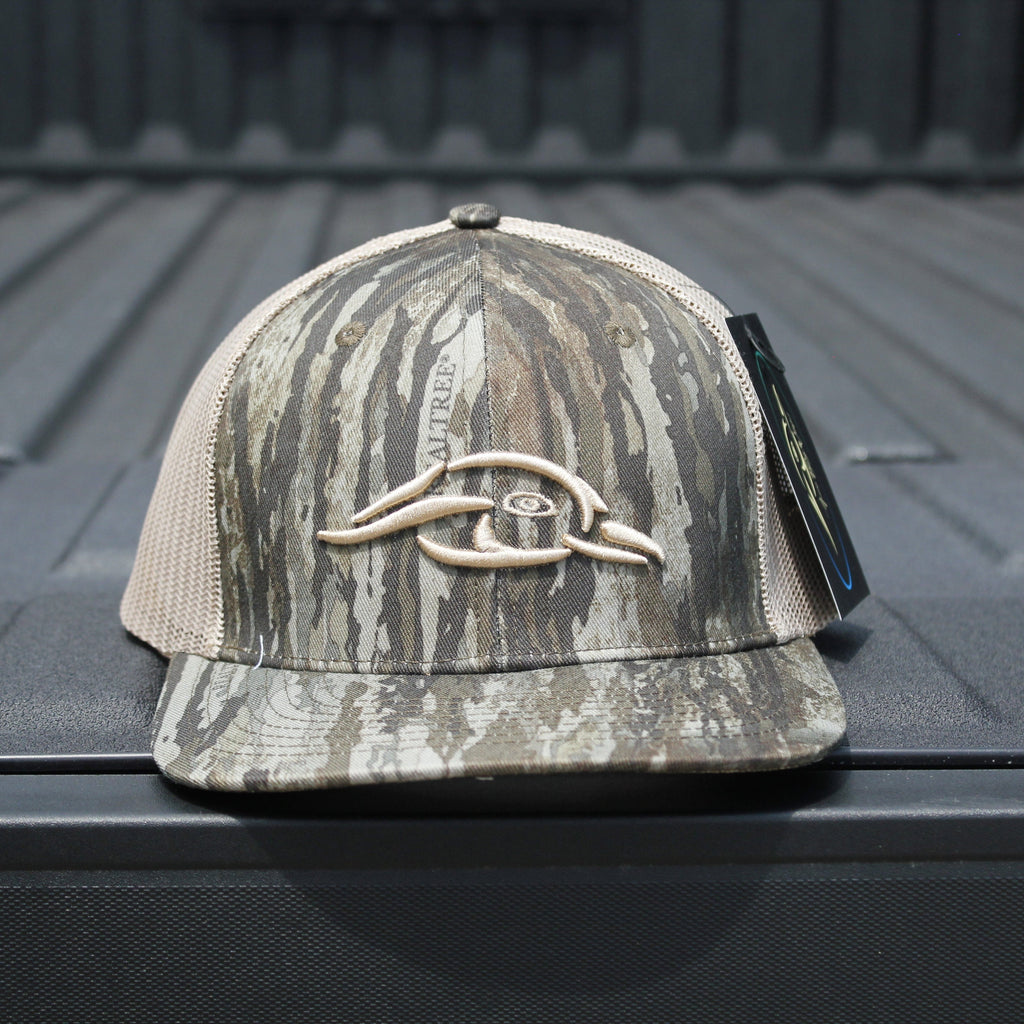 American Flyway Waterfowl trucker hat — mesh back detail with AFW duck logo on a truck bed