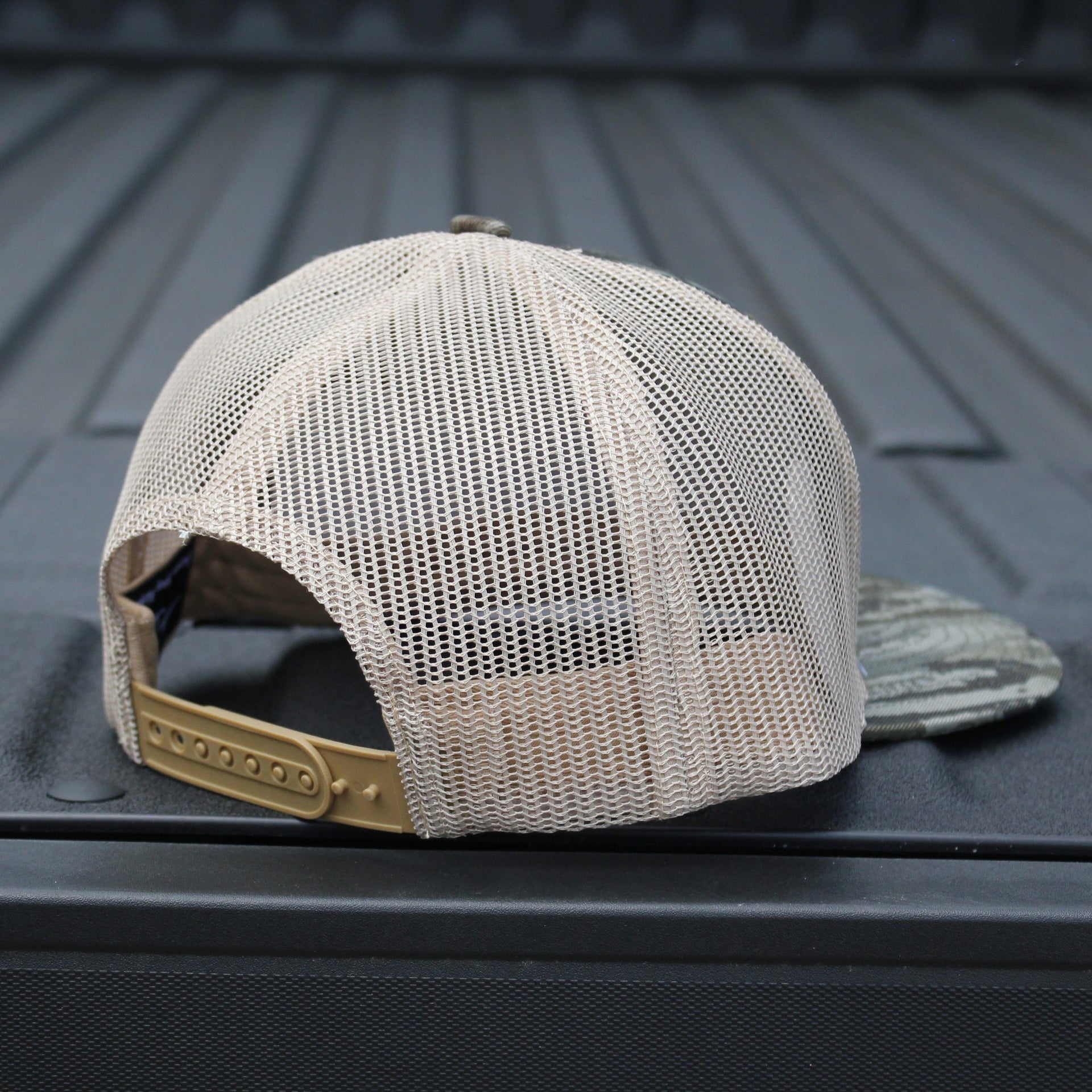 Realtree Legacy camo trucker hat — snap closure close-up