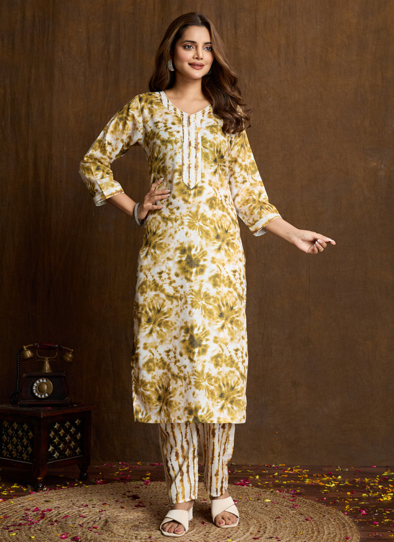Elegant cream colored printed cotton blend kurta with coordinating pants
