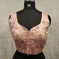 Baby pink satin blouse for girls with golden embroidery and semi-sweetheart neckline