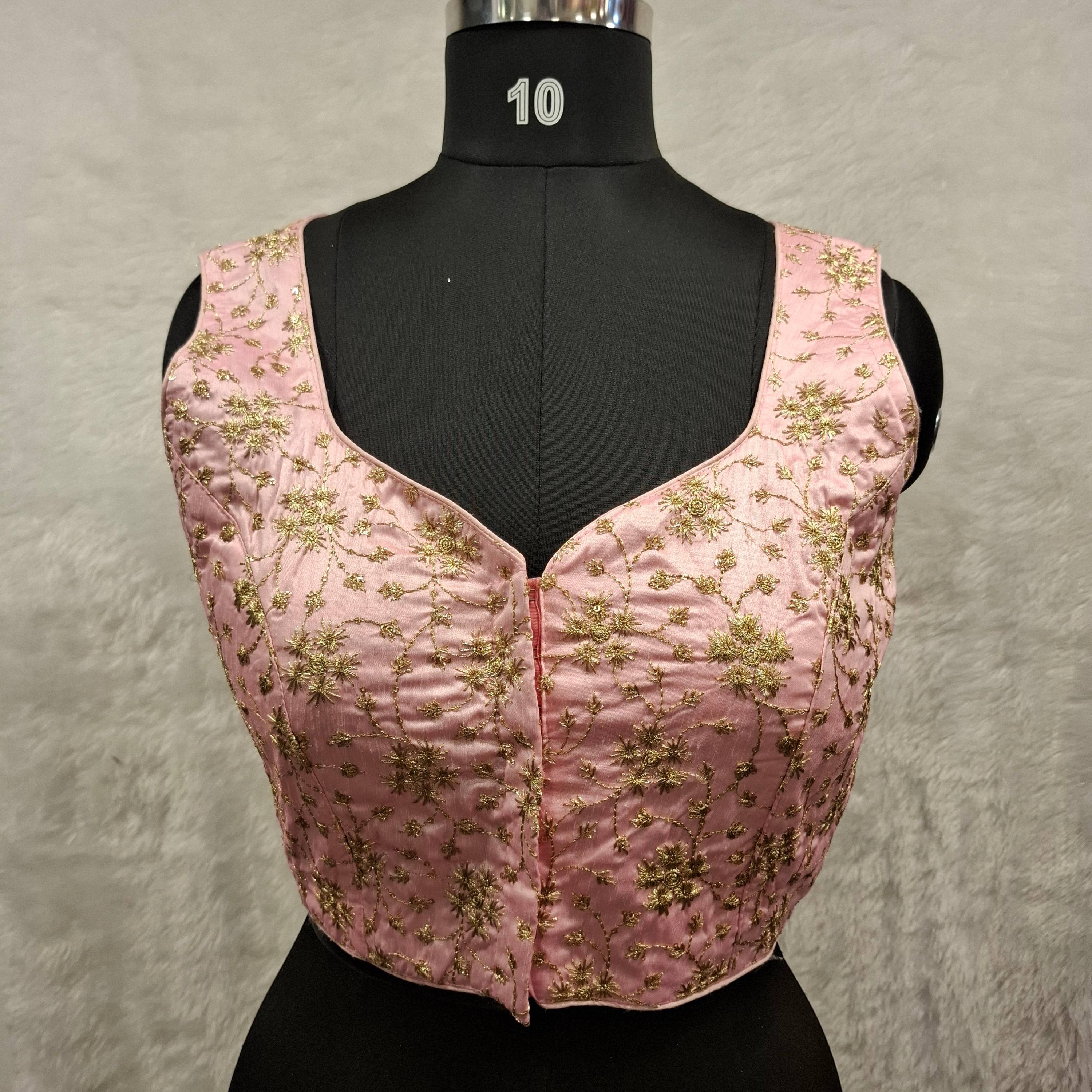 Baby pink satin blouse for girls with golden embroidery and semi-sweetheart neckline