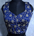 Cobalt blue readymade blouse with golden all-over embroidery and semi-sweetheart neckline