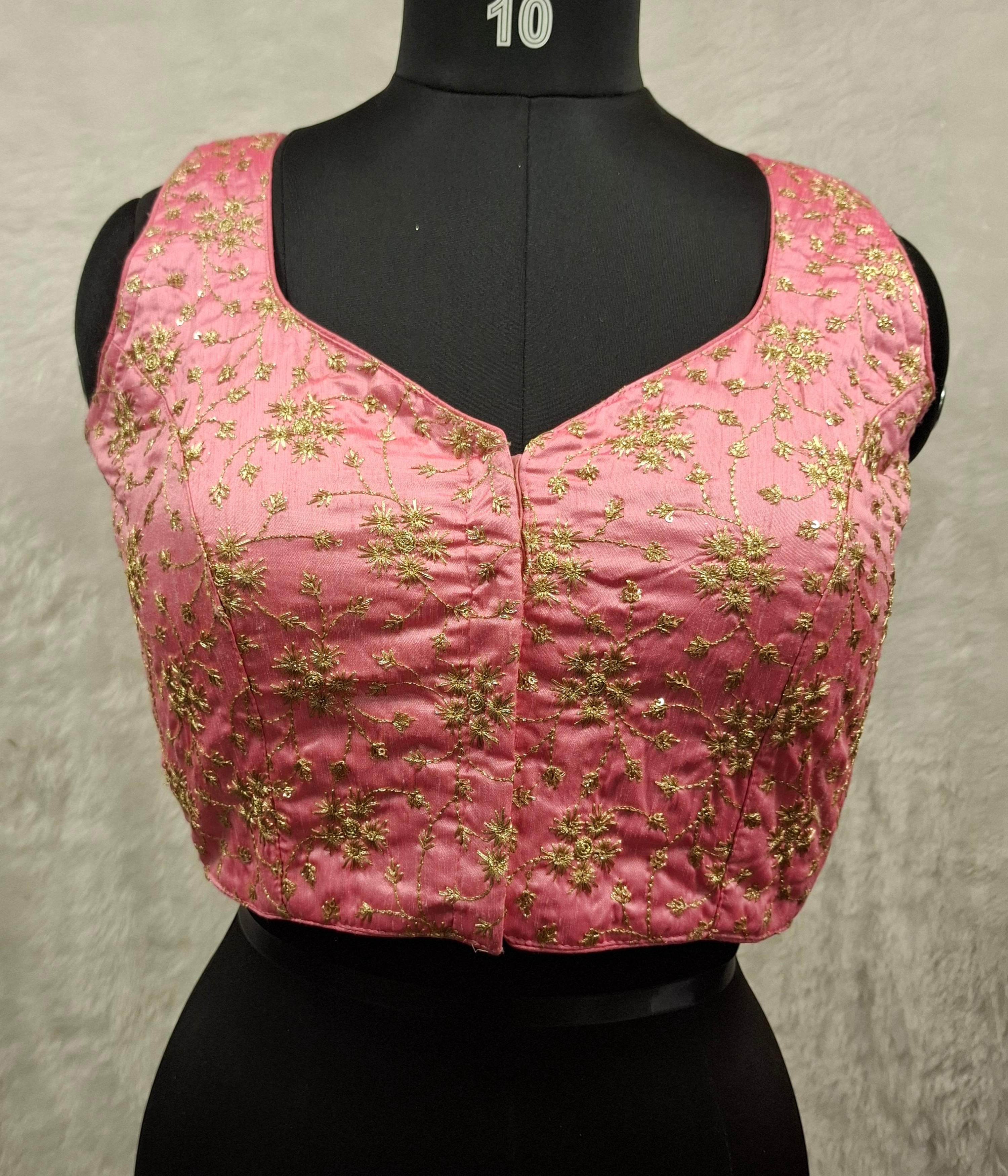 Pink readymade saree blouse with intricate golden all-over embroidery and sweetheart neckline