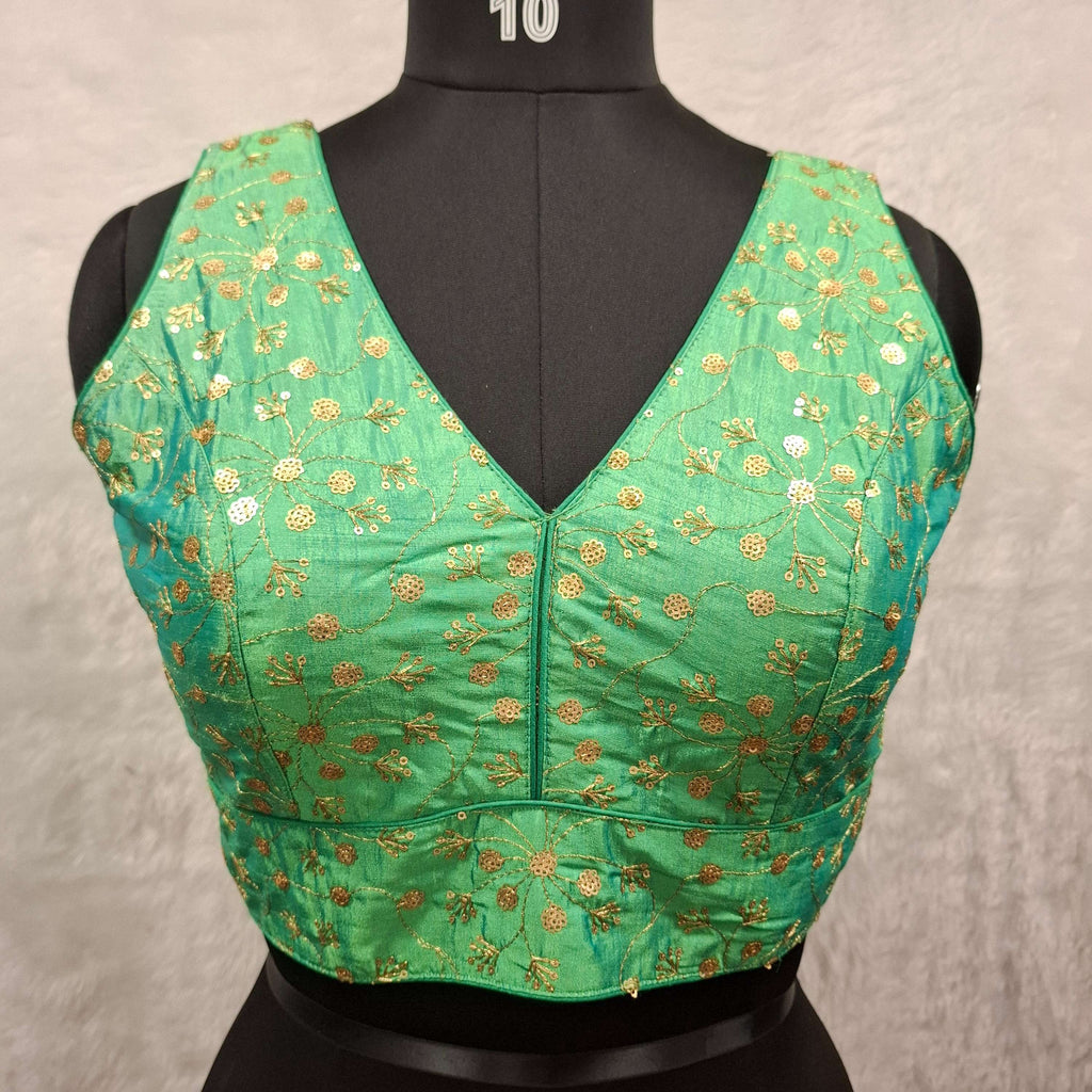 Green twin-tone blouse with all-over golden sequin embroidery