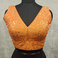 Orange twin tone readymade blouse with golden sequins and V-neckline