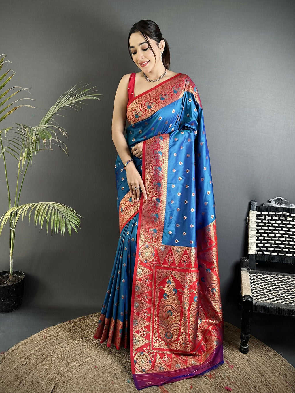 Elegant blue soft silk Banarasi saree with detailed intricate gold motifs