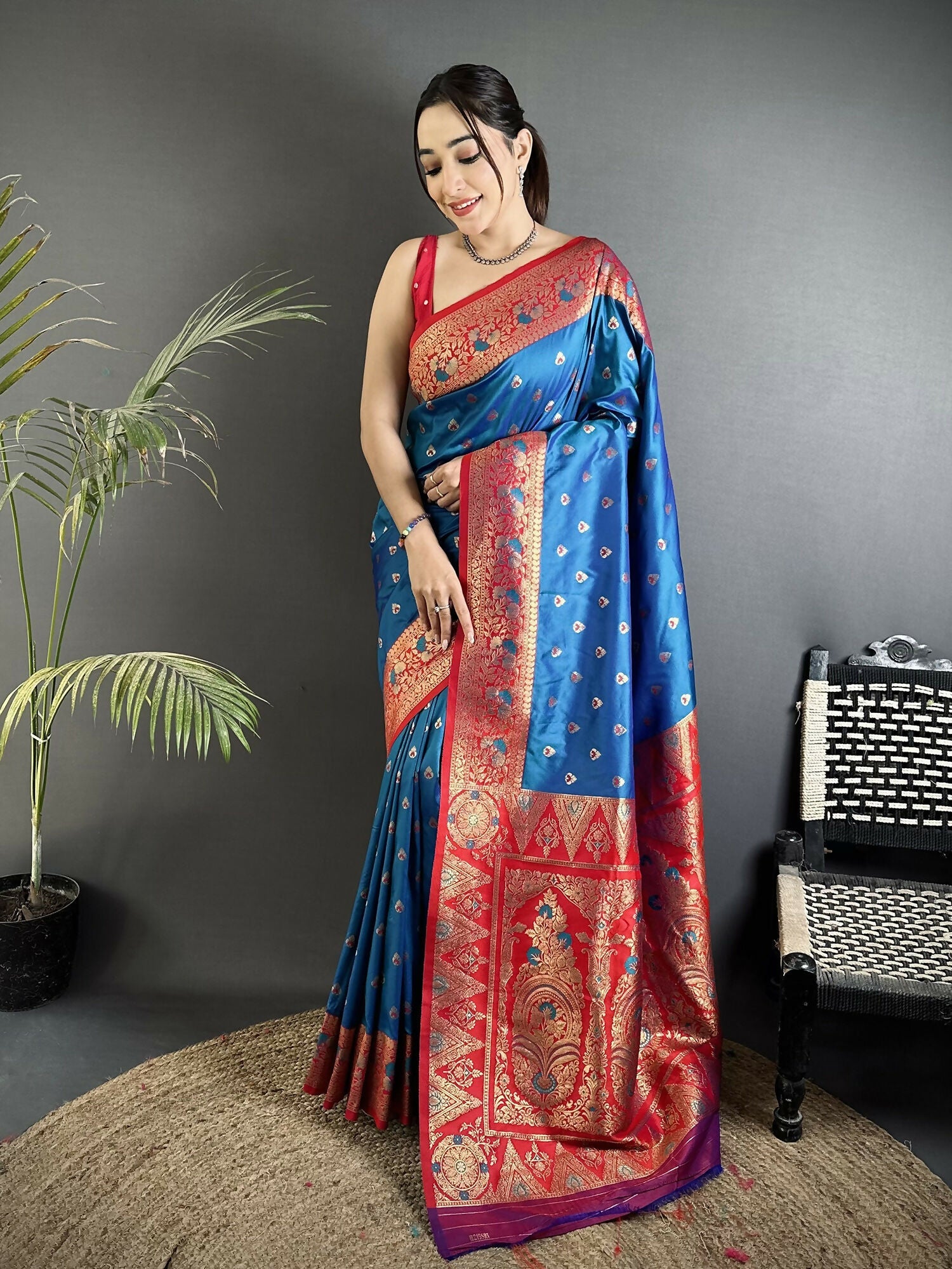Elegant blue soft silk Banarasi saree with detailed intricate gold motifs