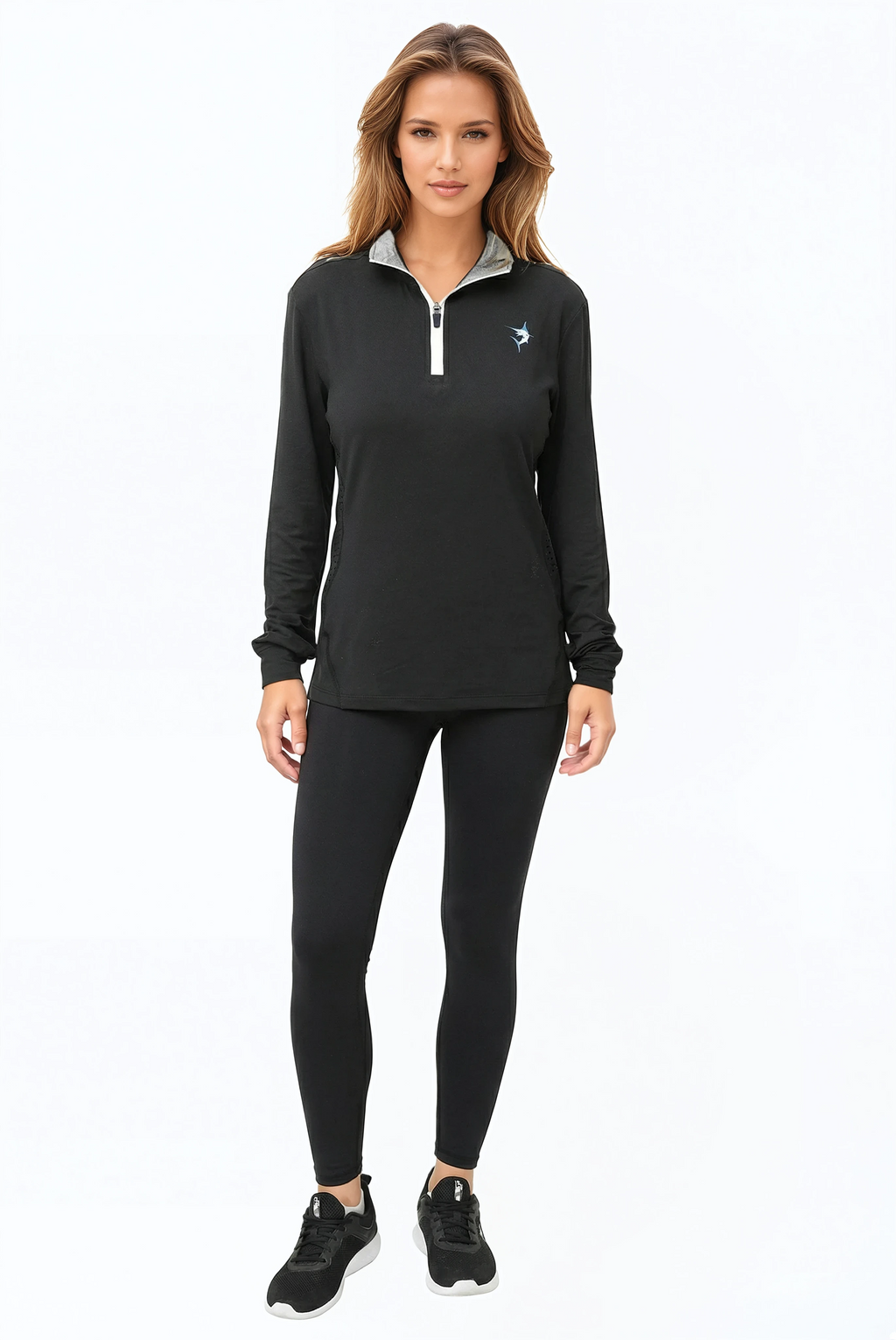 Model wearing a black long-sleeve quarter zip performance top with UV protection.