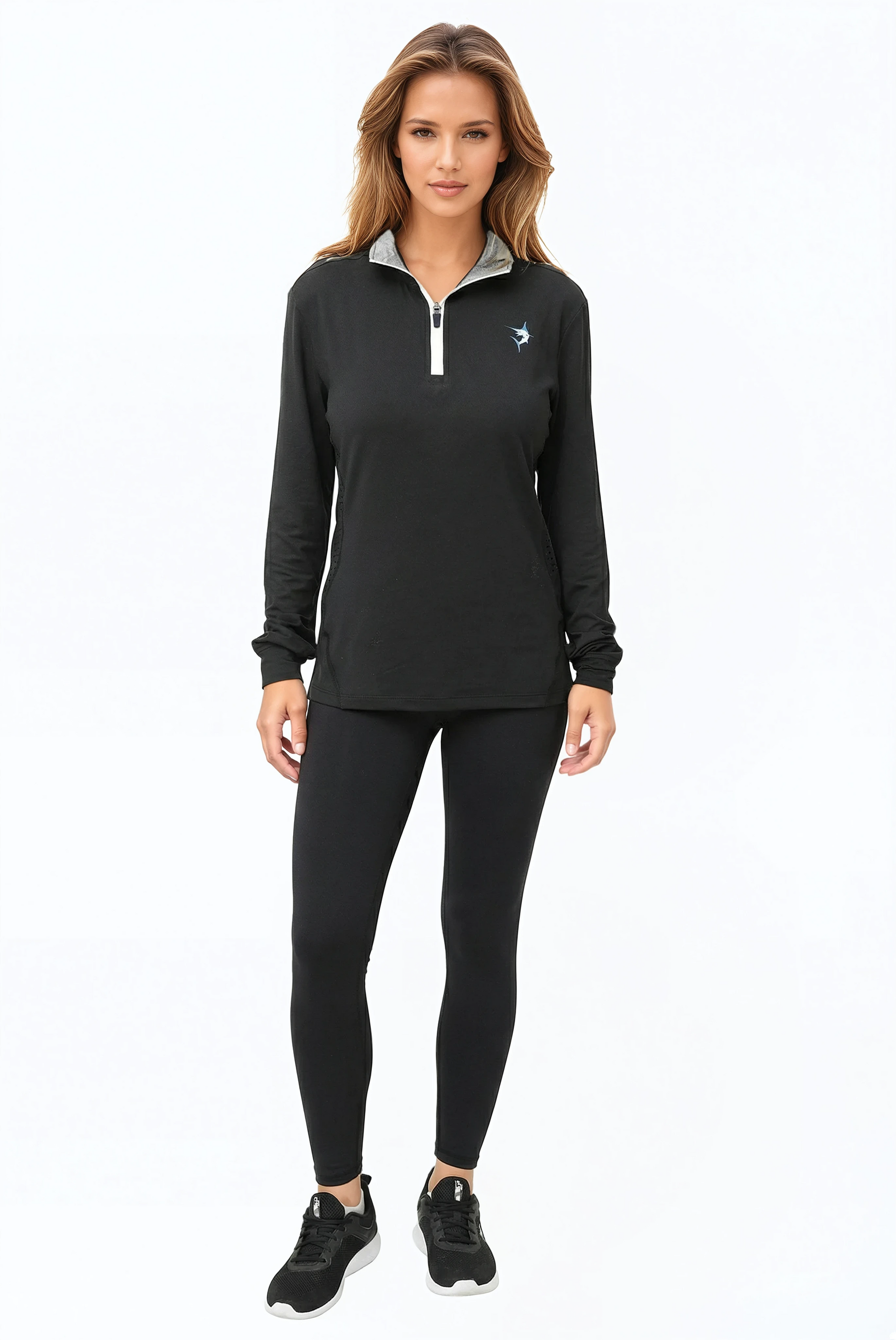 Model wearing a black long-sleeve quarter zip performance top with UV protection.