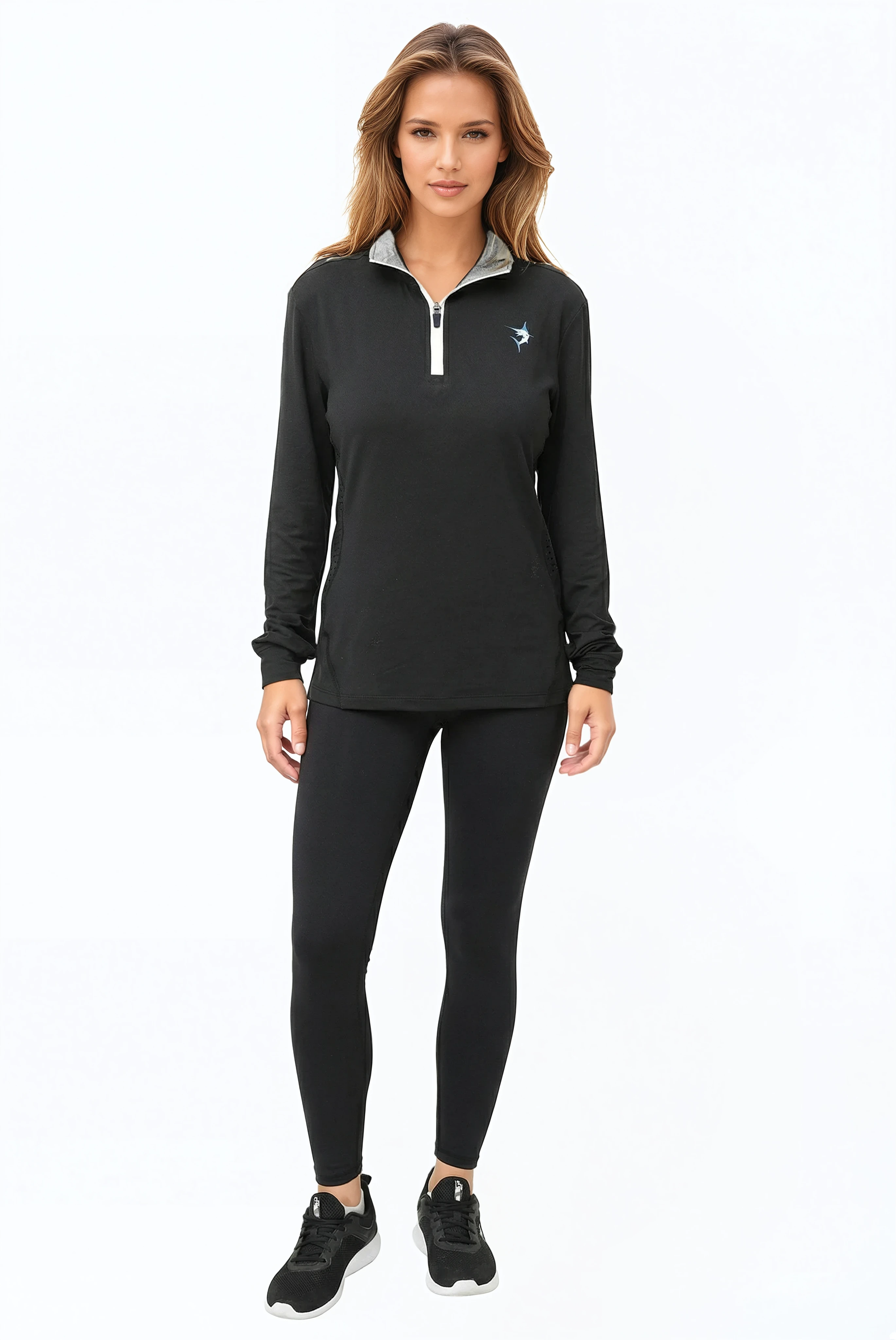 Model wearing a black long-sleeve quarter zip performance top with UV protection.