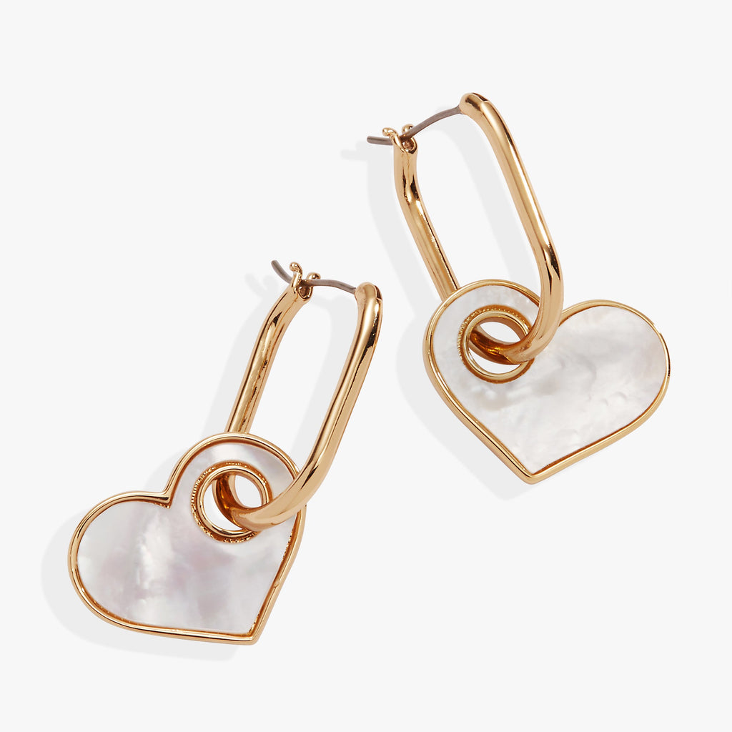 Gold oval hinge hoop earrings with removable iridescent white mother of pearl heart charms