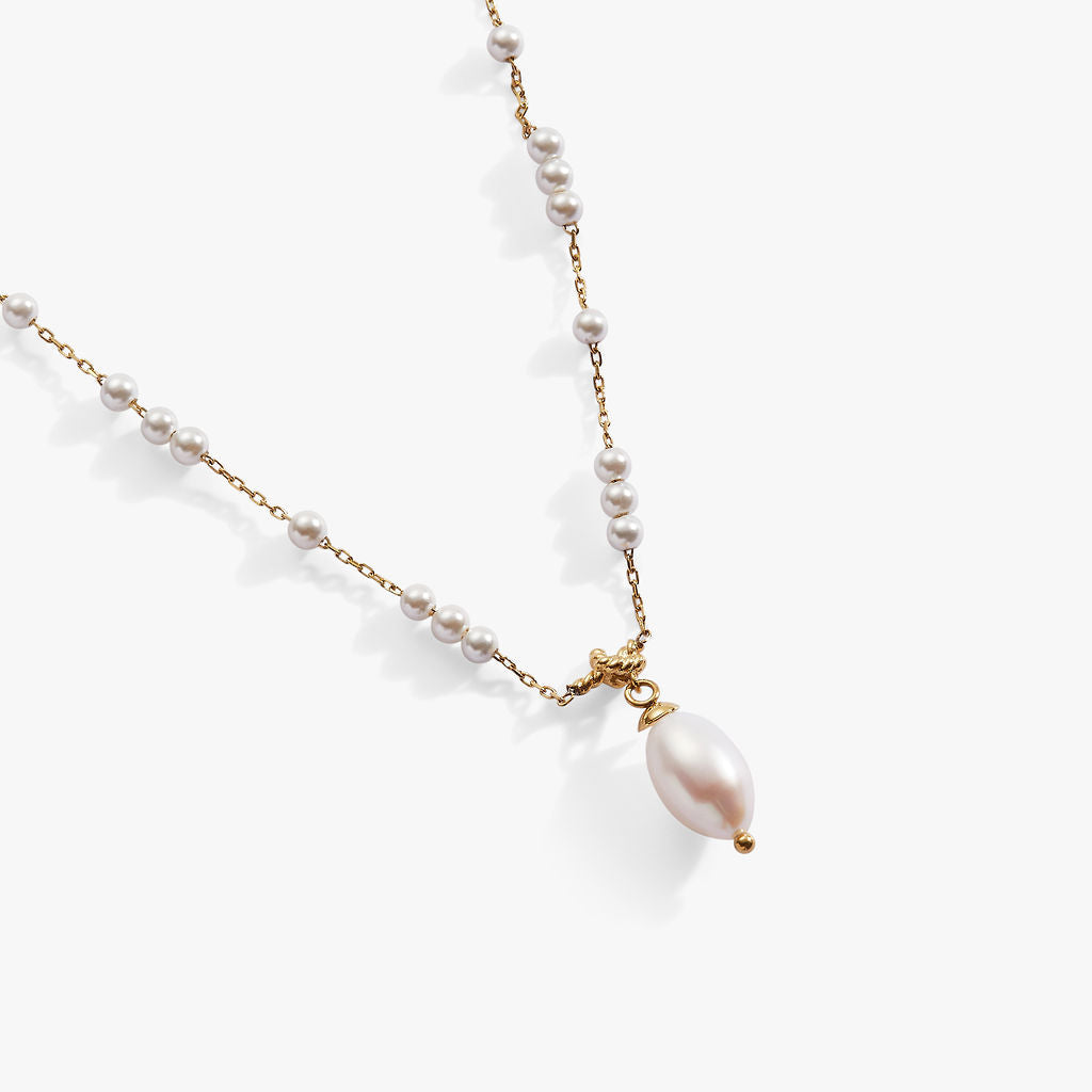 Elegant beaded necklace featuring iridescent genuine Mother of Pearl stones