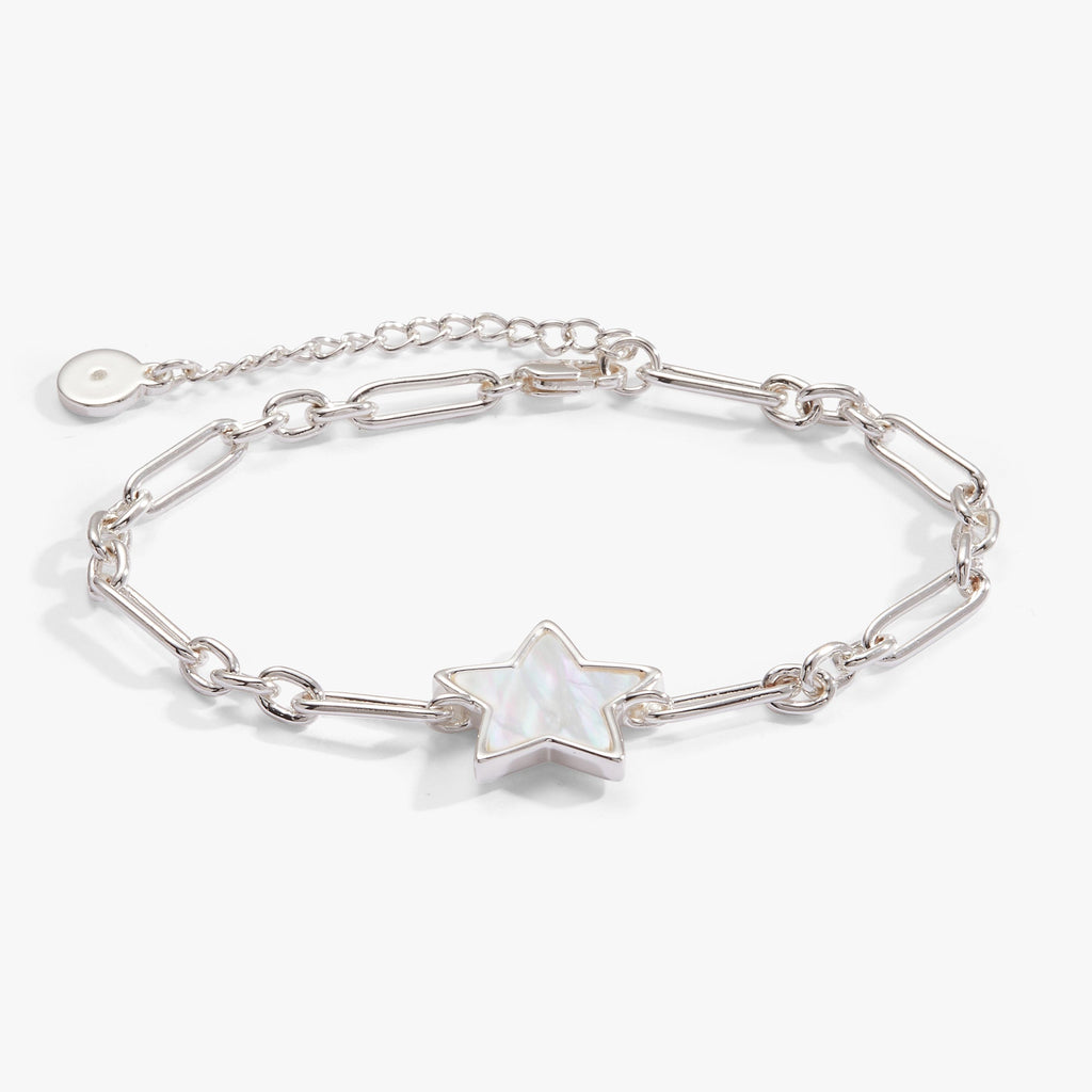 Silver-finish bracelet with a white mother of pearl star charm and lobster clasp closure.