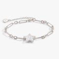 Silver-finish bracelet with a white mother of pearl star charm and lobster clasp closure.