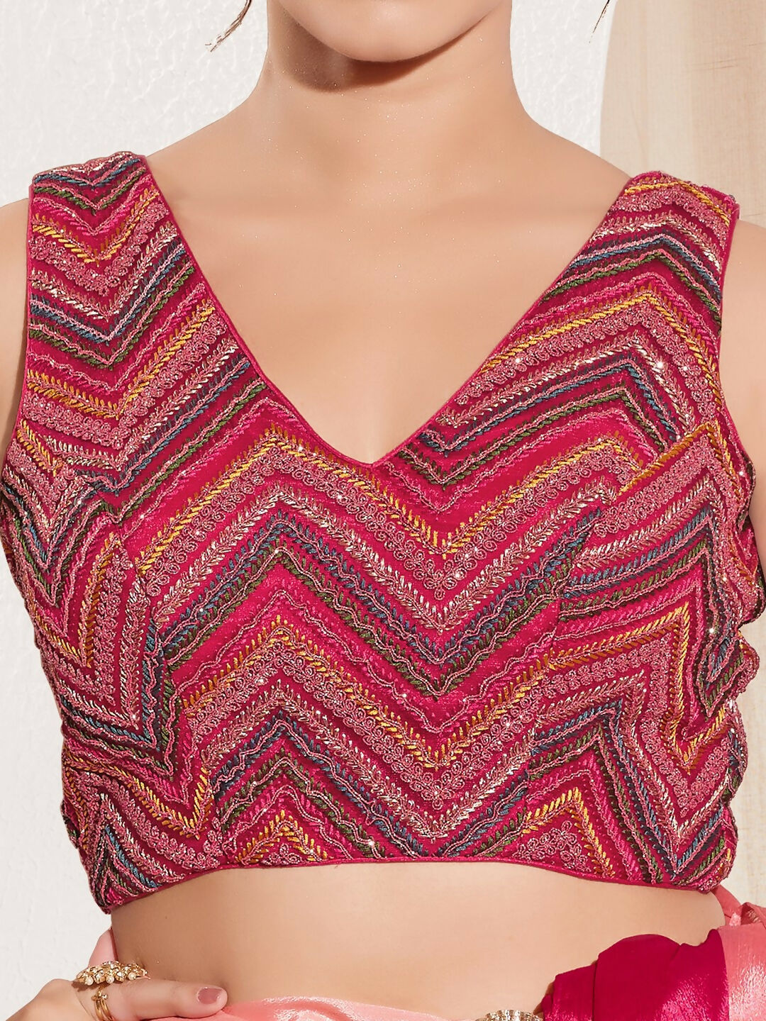 Magenta Net Padded Blouse with V-Neck Sleeveless Cut