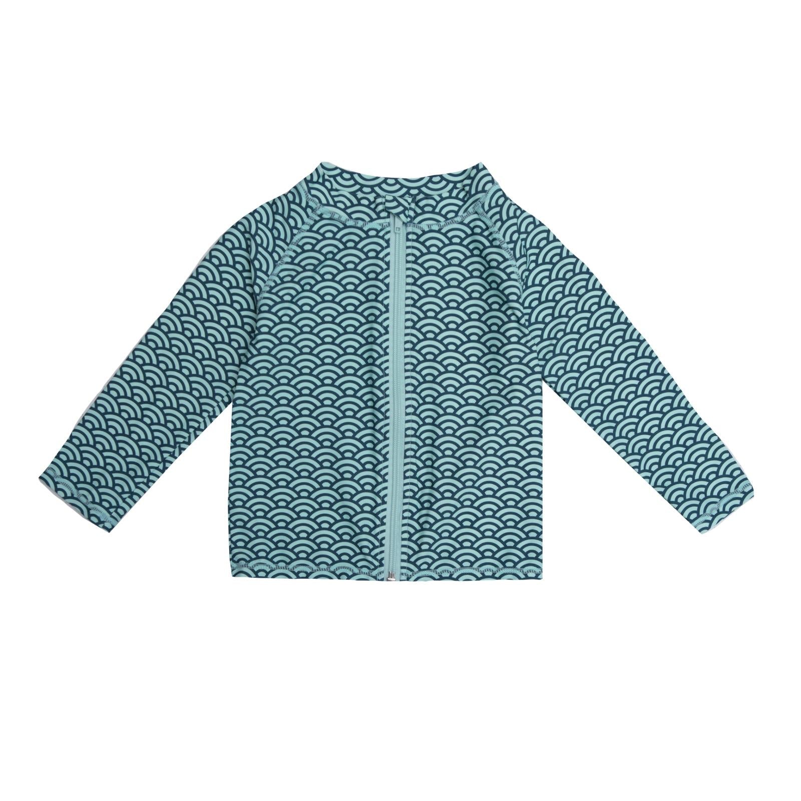 Child wearing a long sleeve zip-front swim cover up with a teal wave print in Summer Sky