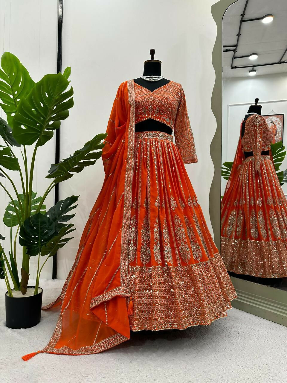 Orange Faux Georgette Lehenga Choli with Sequins and Thread Work