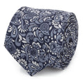 Close up of a rolled navy blue and silver paisley silk necktie with integrated Marvel Avengers character icons.