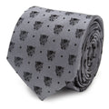 Close up of a gray silk tie with a repeating black Marvel Black Panther mask and small dot pattern