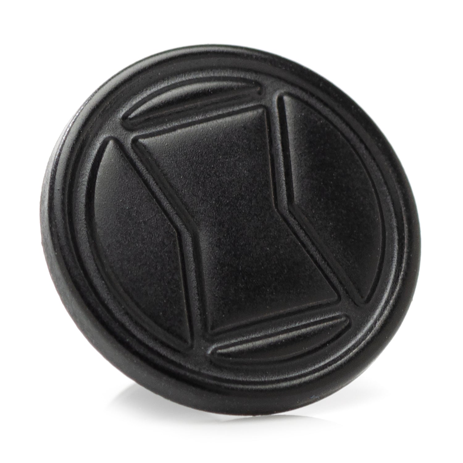Close up view of a circular black metal Marvel Black Widow logo lapel pin