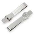 A silver-tone Marvel Captain America tie bar with a shield emblem on the front and a hidden engraved message on the back.