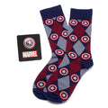 Captain America themed navy blue argyle socks featuring shield patterns next to a Captain America shield lapel pin.