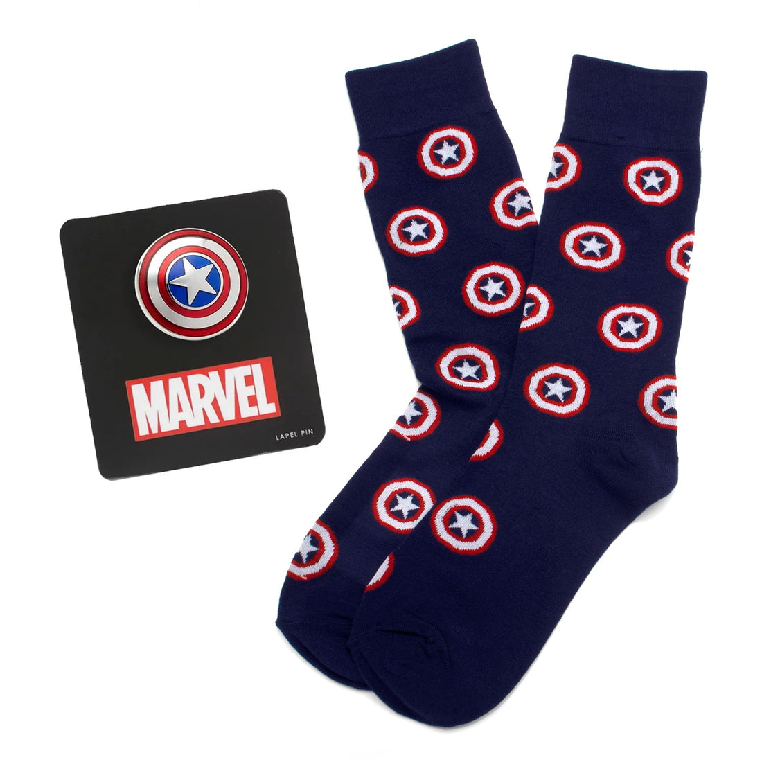 Captain America navy blue socks with red and white shield patterns next to a Captain America shield lapel pin on a Marvel display card.