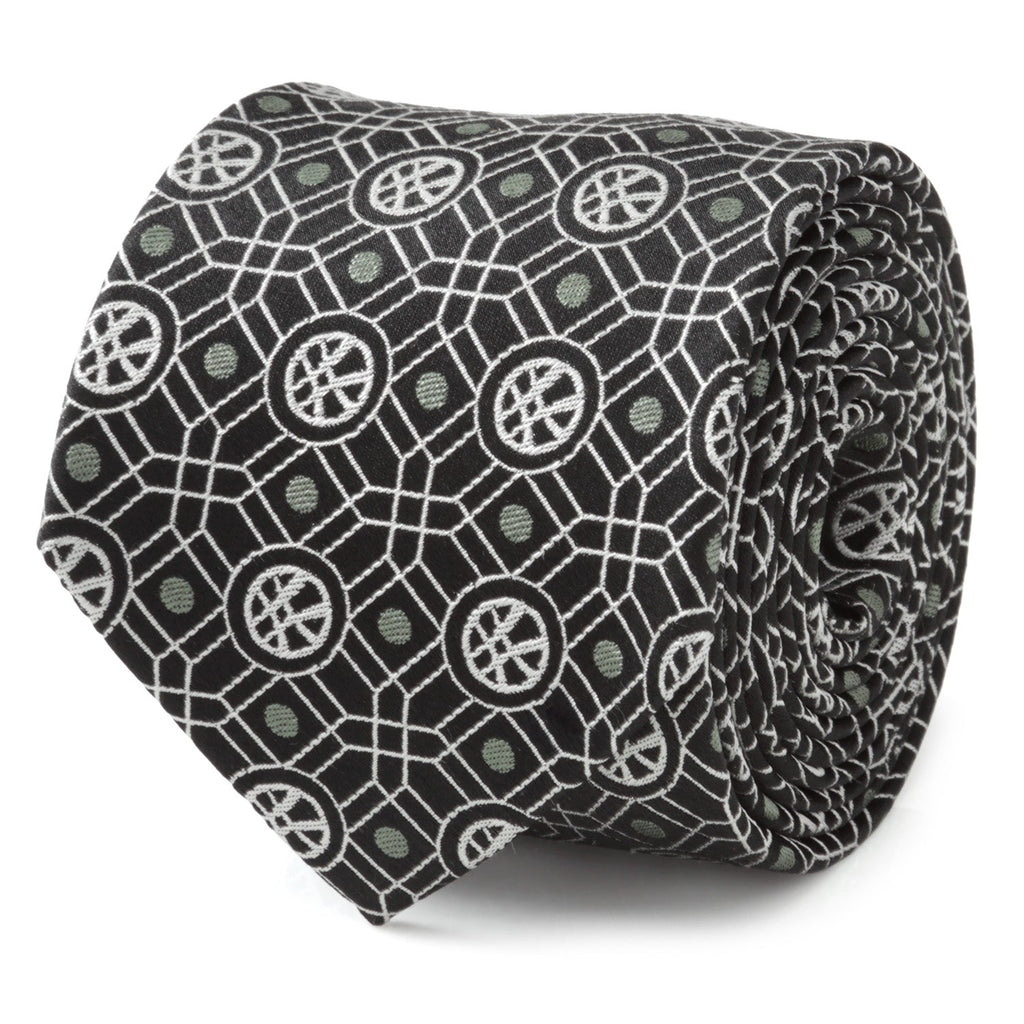 Close up of black Marvel Doctor Strange necktie with geometric pattern and sage green dots
