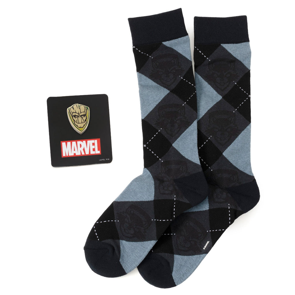A gift set containing blue and black argyle socks with Rocket Raccoon print and a Groot character lapel pin on a Marvel branded backing card.