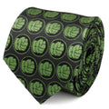 Close-up of a black men's necktie featuring a repeating green Hulk fist pattern.