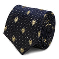 Navy blue silk necktie with gold Iron Man helmet motifs and small gray dots, displayed tied on a mannequin