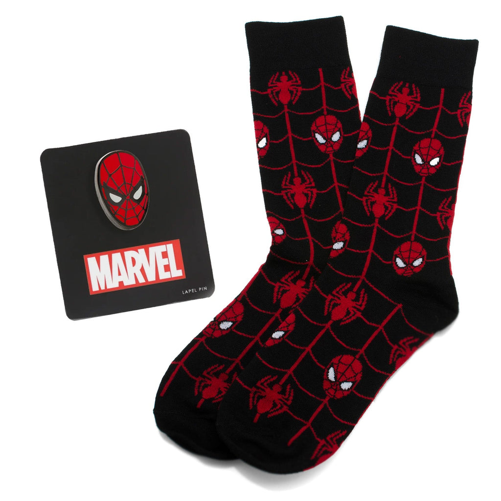 A gift set featuring black and red Spider-Man web-patterned crew socks paired with a Spider-Man mask enamel lapel pin.