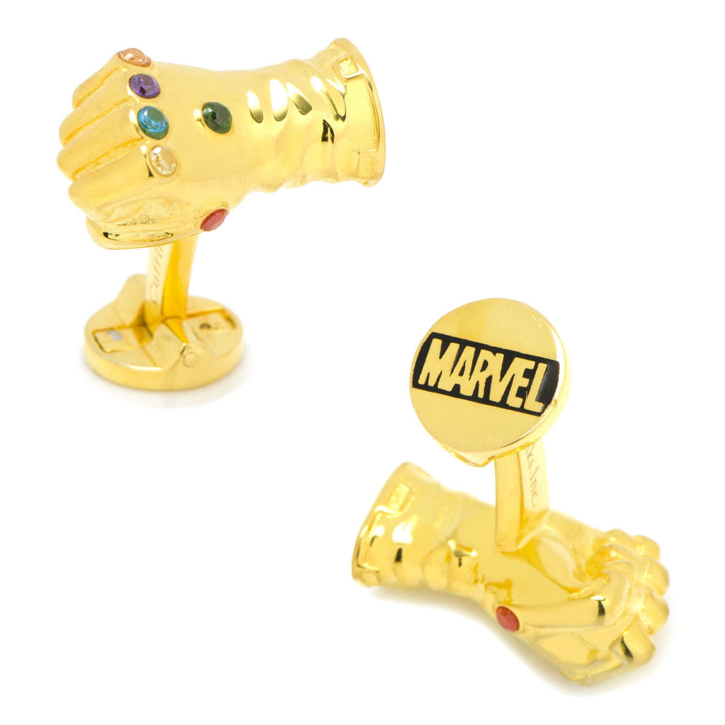 A pair of gold-tone Marvel Thanos Infinity Gauntlet cufflinks featuring colorful embedded stones and Marvel branding on the backings.