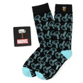 A Marvel Thor themed gift set including black socks with a light blue hammer pattern and a 3D Mjolnir lapel pin.