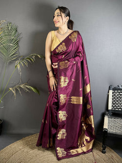 Magenta soft silk Banarasi saree featuring intricate gold Zari motifs and coordinating blouse fabric