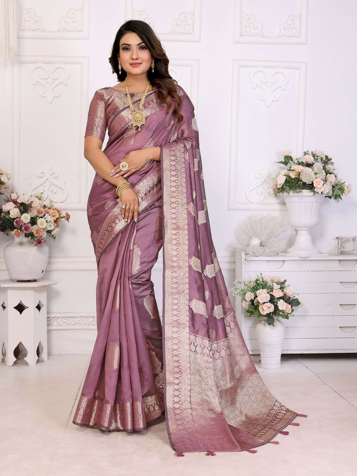 Deep purple soft organza silk saree with elegant woven texture.