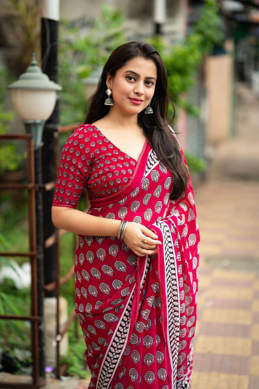 Rani Poly Georgette Ajrak Saree with Unstitched Blouse Piece
